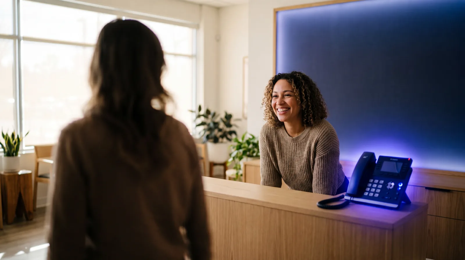 AI receptionist or a new hire? What each one really costs